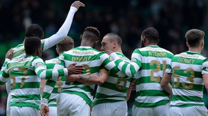 Celtic mob Moussa Dembele after his second goal