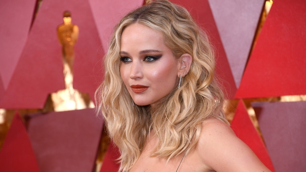 The stars walk the red carpet at the 90th Academy Awards