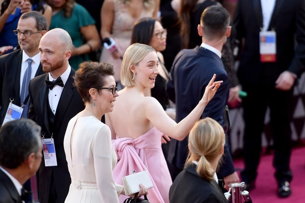 Saoirse Ronan pictured with her Mum Marian on the red carpet waving at fans