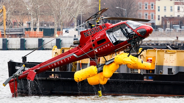 The Eurocopter AS350 was lifted from the East River yesterday