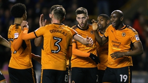 Wolverhampton Wanderers' Matt Doherty (third right) did his bit to keep his side top of the pile
