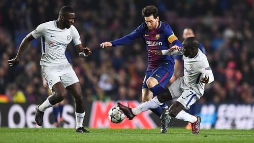Lionel Messi is challenged by N'Golo Kante and Antonio Rudiger