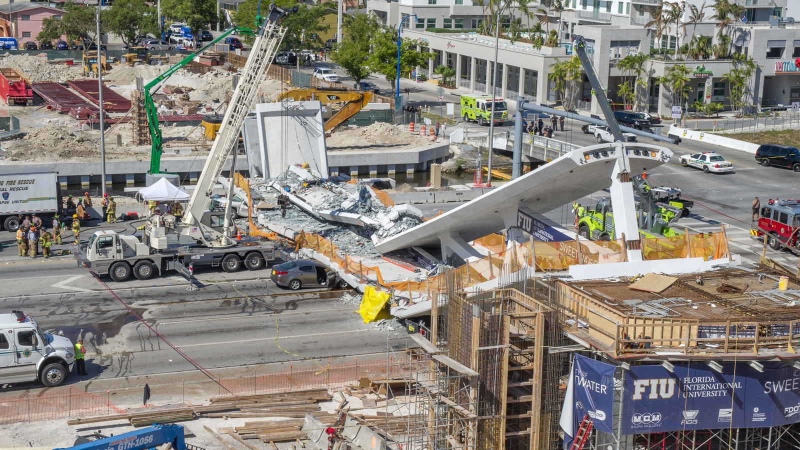 Baltimore bridge collapse. Мост Бостонского университета. Американские рабочие на стройке Майами.