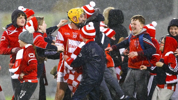 Cuala's supporters celebrate with Cian Waldron after the semi-final win against Liam Mellows