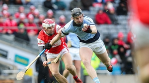 Cuala's Cian O'Callaghan with Kevin Downes of Na Piarsaigh