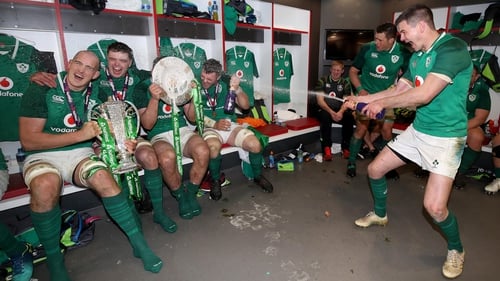 Johnny Sexton leads the celebrations in the changing room