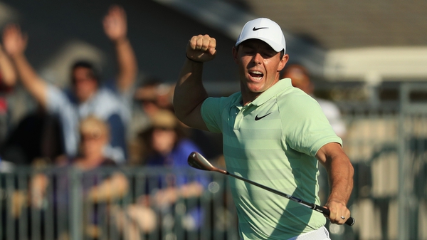 McIlroy shows his emotion after sinking a remarkable birdie on the last