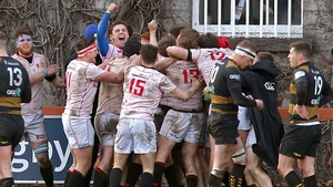 Dublin University players celebrate Tommy Whittle's late try