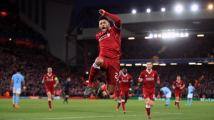 Alex Oxlade-Chamberlain celebrate's Liverpool's second goal