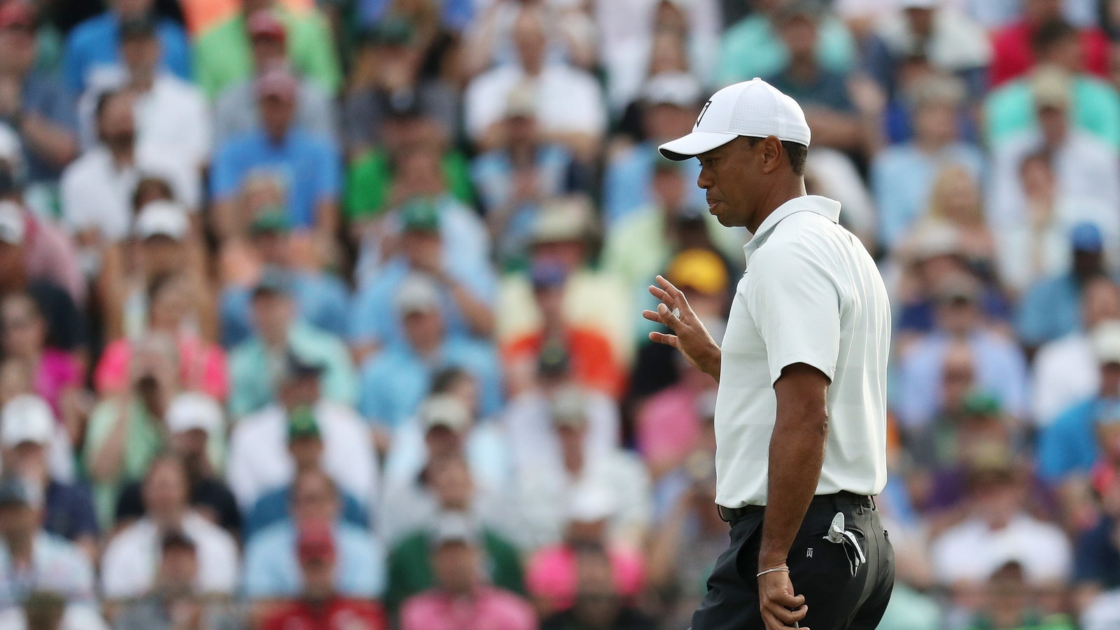 Tiger, 13 shots behind, says he'll need 'a lot of help'