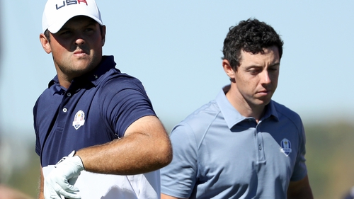 Patrick Reed and Rory McIlroy (r) have history