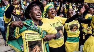 Mourners gather at the Orlando Stadium in Soweto, outside Johannesburg