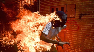 The winning photo was taken during violent clashes in Venezuela last year