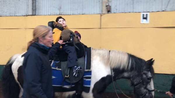 The natural rhythm of a horse's walk helped with Darragh's muscle strength and his digestion, his family say