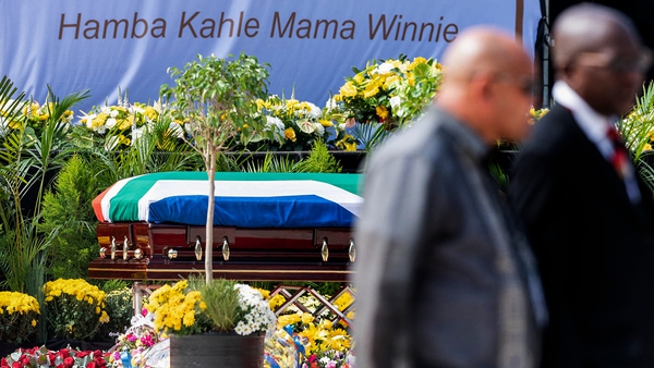 Mourners sang and cheered as her body was brought into the Orlando stadium where the funeral service was taking place