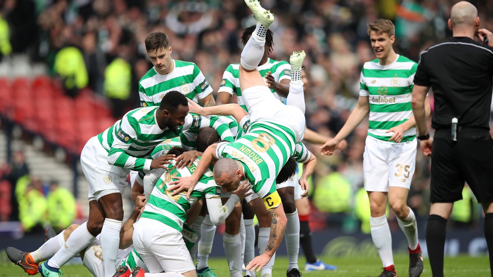 Celtic sink 10-man Rangers to book Cup final place