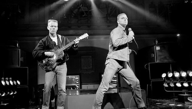 Erasure Vince Clarke (left) and singer Andy Bell perform during the recording of RTÉ Television's 'Megamix', in Dublin's Cathedral Club in October 1986.