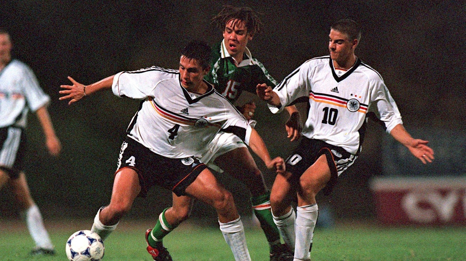 Image - George is sandwiched by Marcel Rapp, left, and Sebastian Deisler
