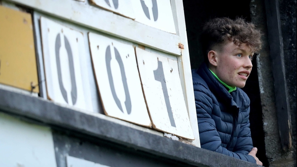 The scoreboard operator watches on during the Munster MFC Playoff semi-final between Limerick and Tipp in Newcastle West