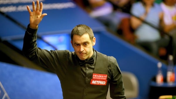 Ronnie O'Sullivan celebrates after beating Steven Maguire
