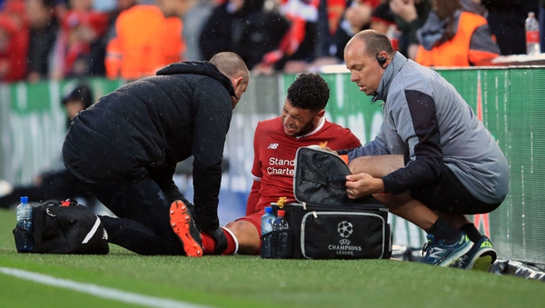 Oxlade-Chamberlain was carried off on a stretcher with his right knee in a brace