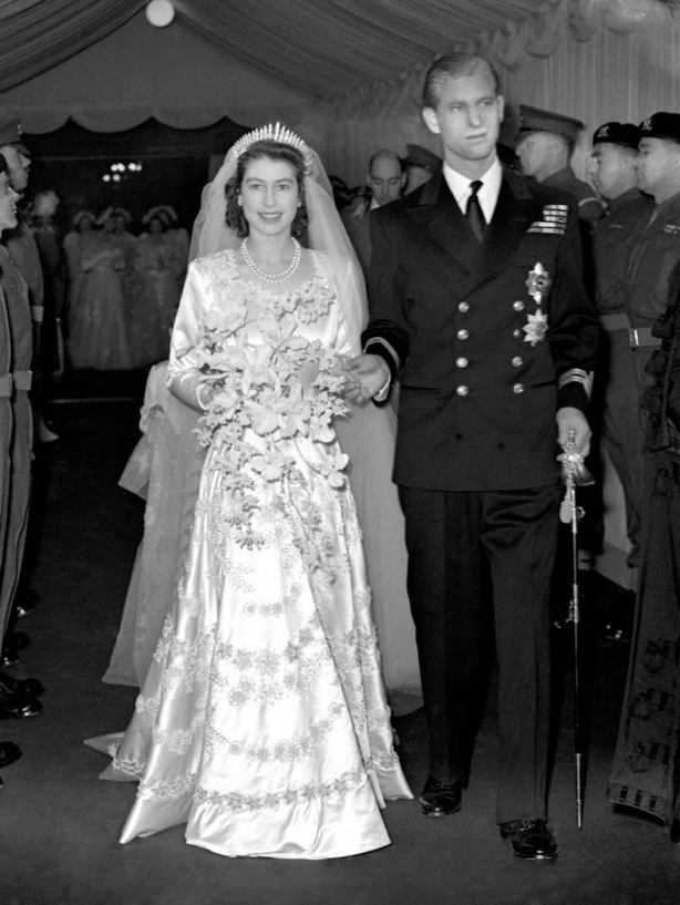 Queen Elizabeth II and Prince Philip leaving Westminster Abbey (PA)