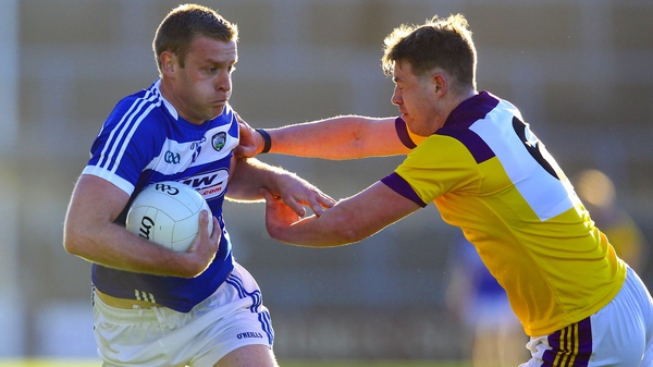 Donal Kingston of Laois in action against Wexford's Naomhan Rossiter