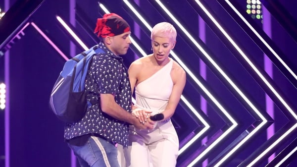 SuRie was joined by a stage invader during Eurovision Final