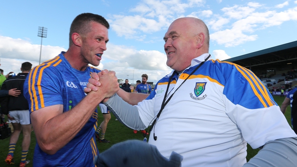 Rory Finn and John Evans celebrate at the final whistle after Wicklow's win over Offaly