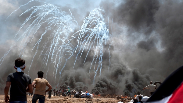 The deaths bring to 61 the total number of Palestinians killed by Israeli gunfire on Monday