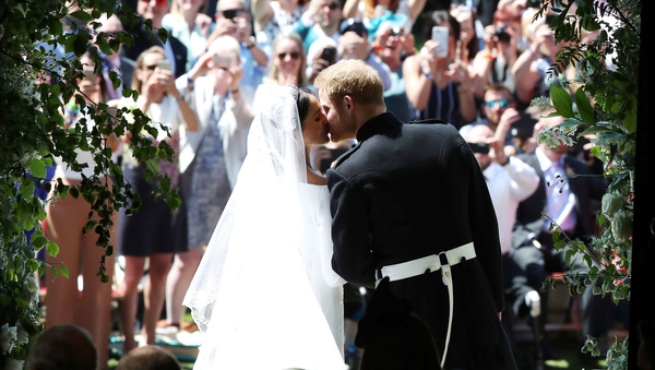 Prince Harry and Meghan Markle delight crowds with a kiss