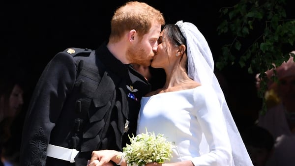Prince Harry and Meghan Markle kiss on the steps of St George's Chapel