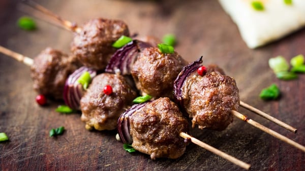 Grilled Lamb Kebabs with fresh tomato sauce on