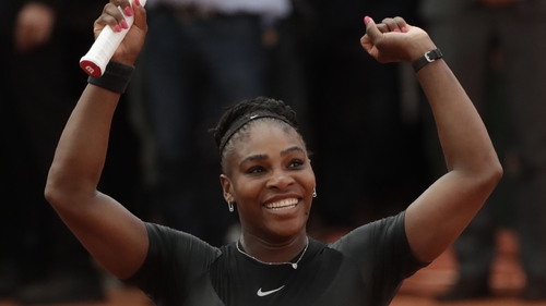 Serena Williams salutes the fans