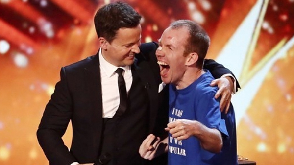 Lee Ridley is congratulated by BGT host Declan Donnelly after his win Photo credit: ITV/Britain's Got Talent