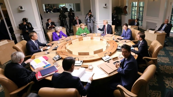 Leaders of the G7 participate in a working session of the G7 Summit in La Malbaie, Quebec, Canada