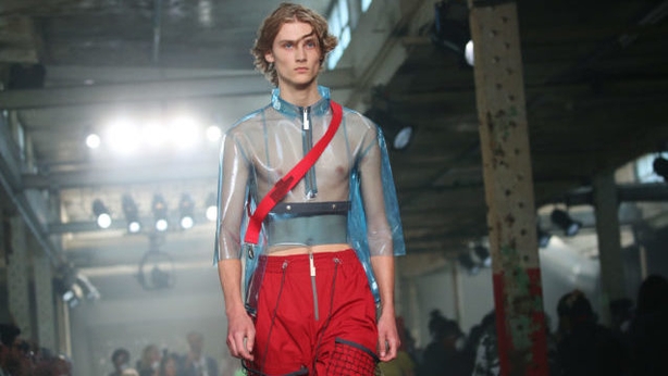 A model on the catwalk at London Fashion Week Men's SS19 show