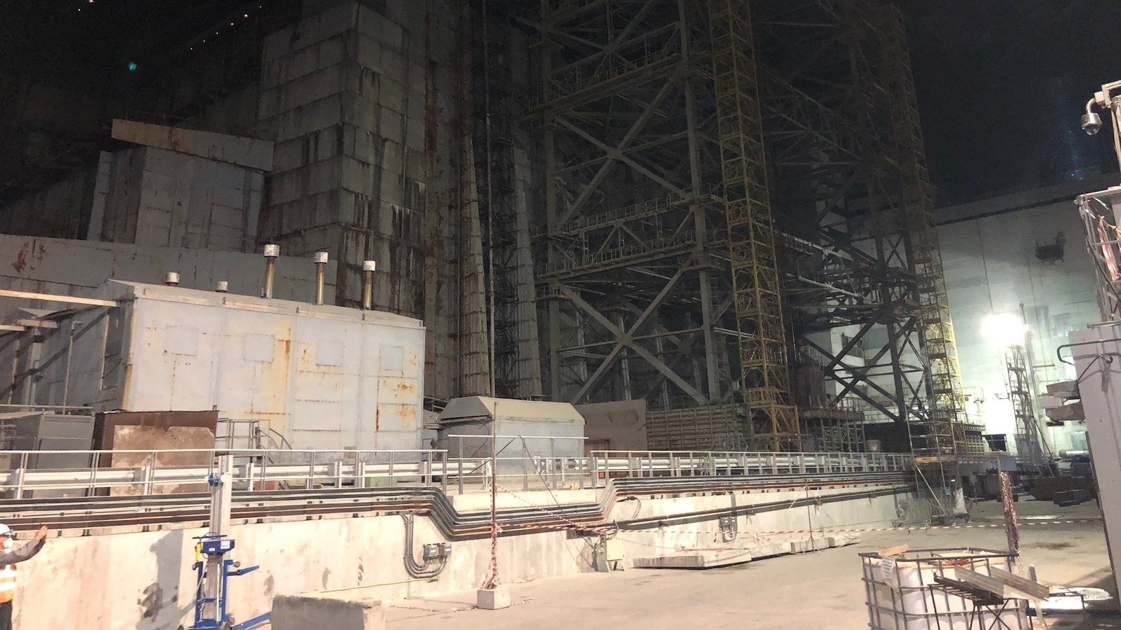 Image - The remains of the original concrete sarcophagus surrounding Reactor No.4 inside the NSC unit