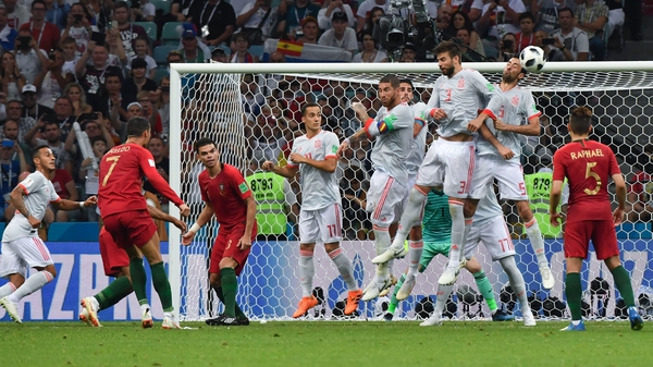 Portugal's forward Cristiano Ronaldo scores his third