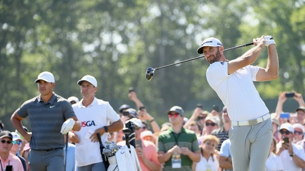Brooks Koepka holds the lead in the final round of the US Open with Dustin Johnson in the chasing pack