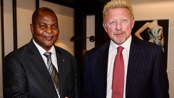 Boris Becker shaking hands with CAR President Faustin-Archange Touadera in April