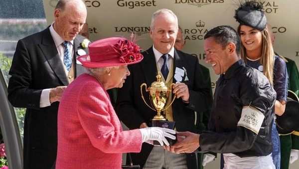 Queen Elizabeth presents Frankie Dettori with The Gold Cup