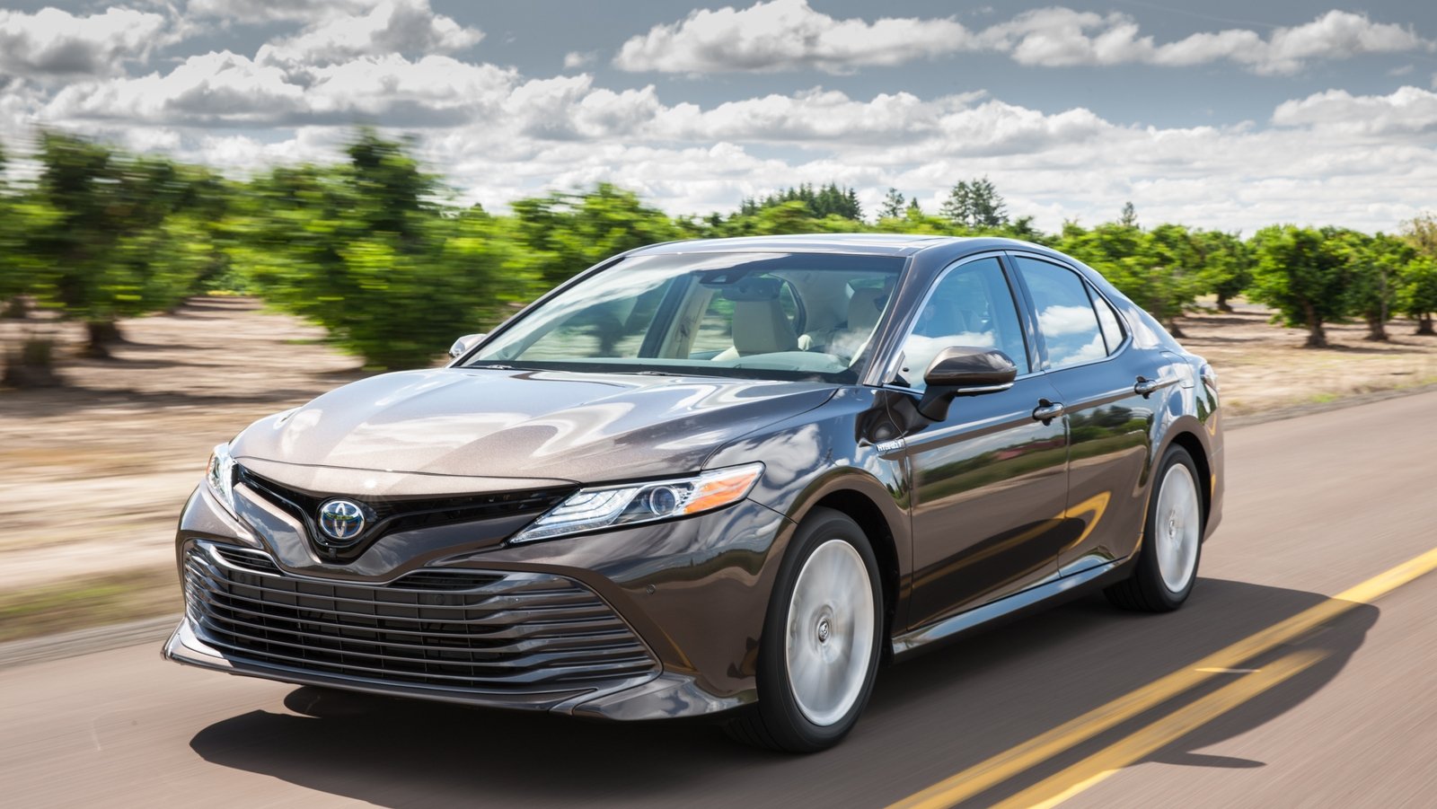 Toyota's Camry resurfaces as a hybrid after fourteen years.