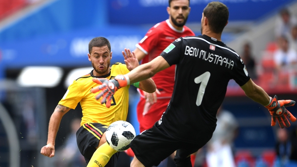 Eden Hazard rounds the Tunisian keeper Ben Mustapha to score his second and Belgium's fourth