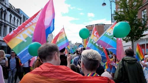 Crowds gather at a Gay Pride parade in Belfast