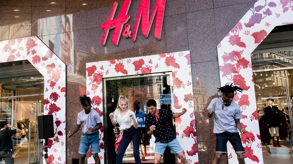 H&M said sales before currency fluctuations were up 8% in the three months from June to August from a year earlier.