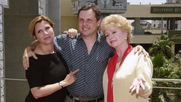 Todd Fisher (centre), with his sister Carrie (left) and their mother Debbie Reynolds.