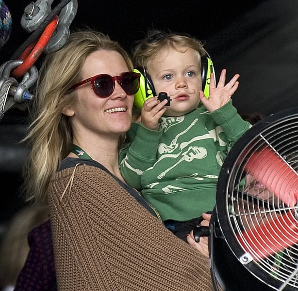 Edith with eldest son Rudy watching daddy Tom Smith perform with The Editors a few yers ago