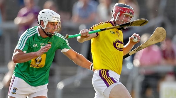 Wexford's Diarmuid O'Keefe battles with Robbie Greville of Westmeath