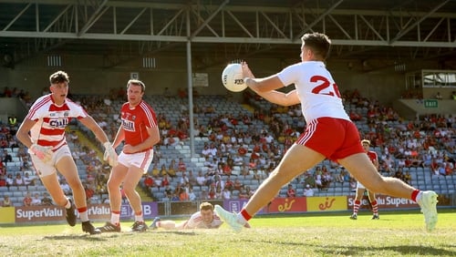 Ronan O'Neill palms home Tyrone's second goal in their 16-point win over Cork in Portlaoise